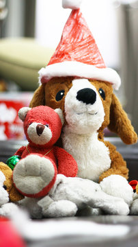 Santa dog / A picture of Santa dog doll and its friends