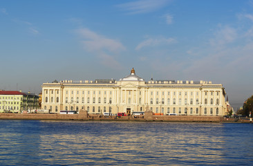 Fototapeta na wymiar Academy of fine arts on Universitetskaya embankment of Neva river, St.Petersburg, Russia