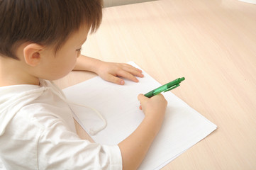 Boy writing