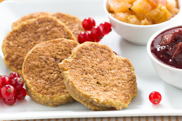 breakfast with homemade pancakes and jams, closeup