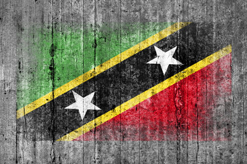 Saint Kitts and Nevis flag painted on background texture gray co
