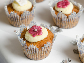 Sponge and cream cup cakes with a shallow depth of field