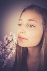 Girl sniff cherry blossoms, grain effect