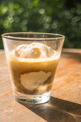 Glass of vanilla ice cream affogato coffee