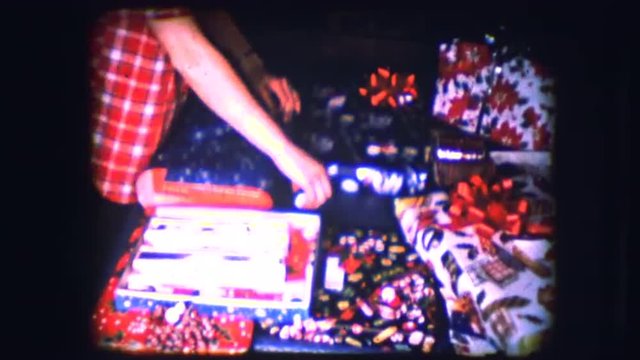 Vintage 8mm footage of wrapping presents