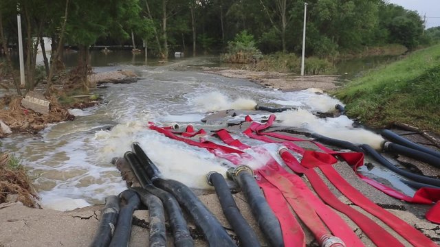 Pumping Out Flood Water With Powerful Pumps