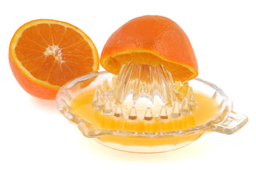Orange sur le presse agrume