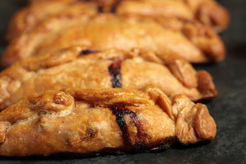homemade pies on a slate background
