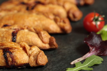 homemade pies on a slate background
