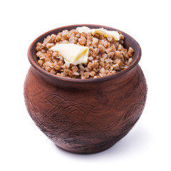 Freshly cooked buckwheat porridge in a clay pot