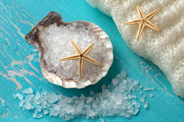 Bath salt in a shell and starfishes