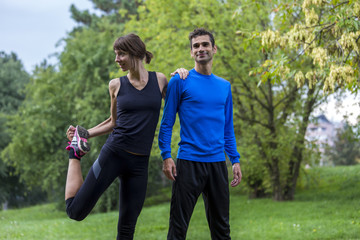 Young couple workout in the park