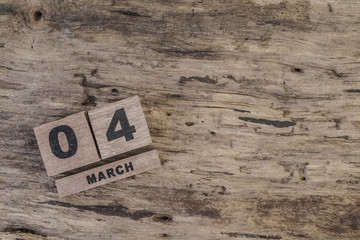 cube calendar for march on wooden surface with copy space (daily)