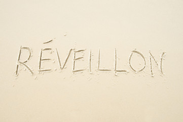 Message for Reveillon (New Year's Eve) written in smooth sand on the beach in Rio de Janeiro, Brazil