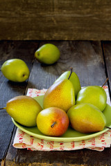 Fresh juicy pears on a table in a rustic style