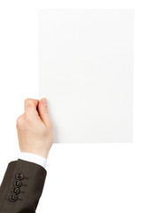 Businessman holding empty piece of paper © cherezoff