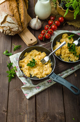 Scrambled eggs with herbs and homemade bread