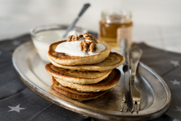 Sour cream pancakes with peanut butter