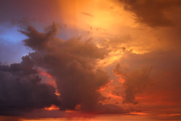 Fototapeta na wymiar Beautiful summer sunset behind a strong thunderstorm in Indiana