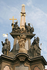 Fototapeta na wymiar PRAGUE, CZECH REPUBLIC - APRIL 16, 2010: Holy Trinity Column (Plague Column) at Lesser Town Square (Mala Strana). Prague, Czech Republic