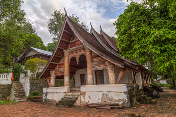 Fototapeta na wymiar Wat Siphoutthabath old temple in Luang Prabang, Laos