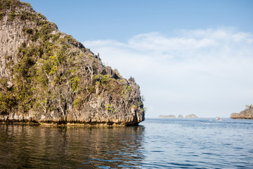 Fototapeta na wymiar Limestone Island and Calm Water