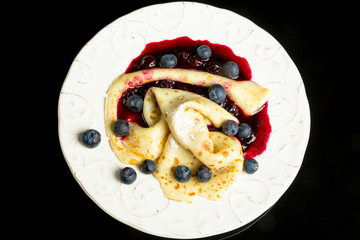 Pancake with blueberry sauce