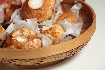 wicker basket full of muffins
