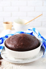 Cooked chocolate pie in a baking tray on a table