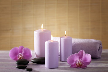 Spa set with flowers on wooden table
