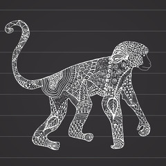 Ornamental hand drawn sketch of monkey in zentangle style. vector illustration with ornament, on chalkboard