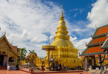 Naklejka premium Golden stupa with church