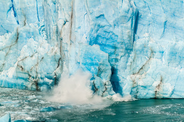 Fototapeta na wymiar Icebergs falling off Perito Moreno glacier in Patagonia, Argentina