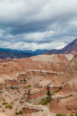 Colorful layered rock formations in Quebrada de Cafayate valley, Argentina. National park Quebrada de las Conchas.