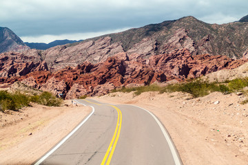 Road through Quebrada de Cafayate valley, which is full of colorful rock formations, northern Argentina.