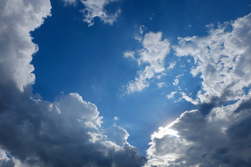 Obraz premium clear weather sky, sun on blue sky with clouds, sun rays