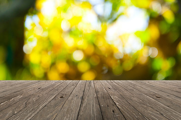 Perspective wood and bokeh light background