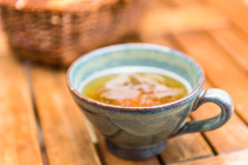 Norman apple cider in a typical ceramic cup