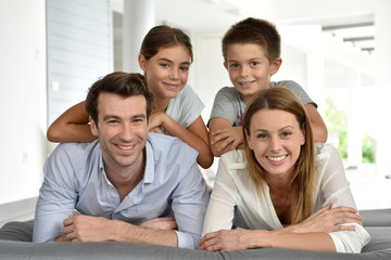 Fototapeta premium Portrait of happy family of four