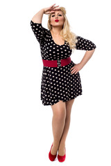 Pretty woman with hand on forehead