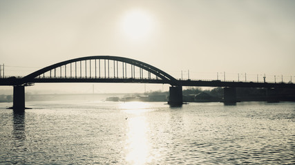 Fototapeta na wymiar Sun above the bridge