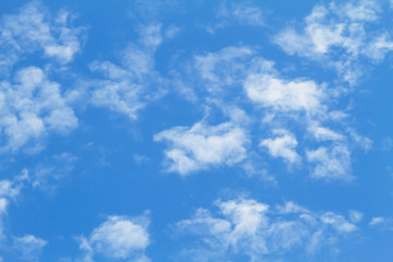 Naklejka na ściany i meble Partly cloudy blue sky background