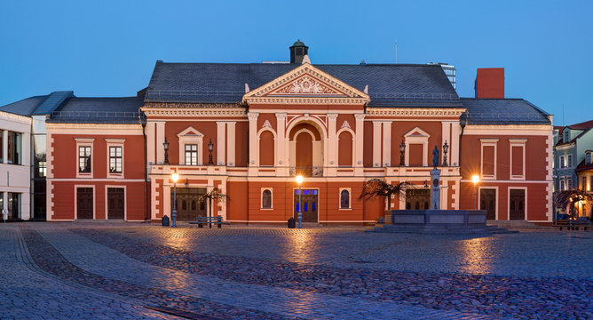 Illuminated facade of the Theater House. Theatre square, Klaipeda. Lithuania