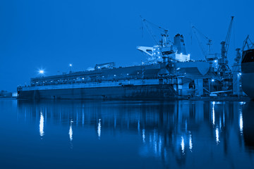 Fototapeta premium Shipyard at night - industry concept.