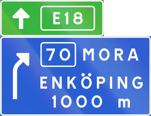 Road sign used in Sweden - Advance direction sign exit ahead from motorway or expressway