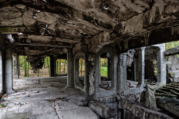 Fototapeta na wymiar Image of the interior old destroyed military barracks after war.