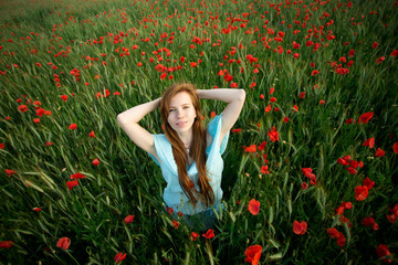 Girl and poppies