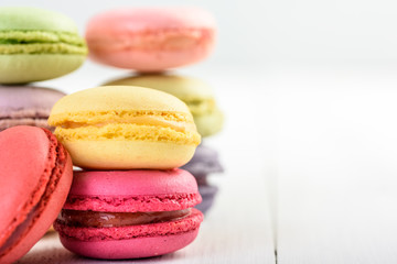 French Macaroons On White Boards Background