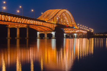 Reflection of Banghwa bridge at night in Seoul,Korea.