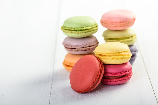 French Macaroons On White Boards Background